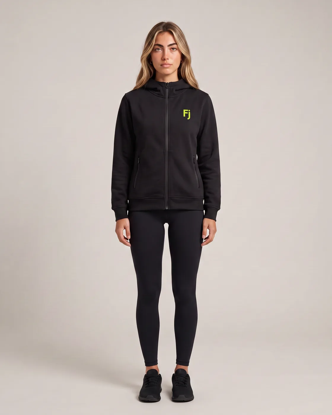 Forjium zip hoodie in a studio photograph