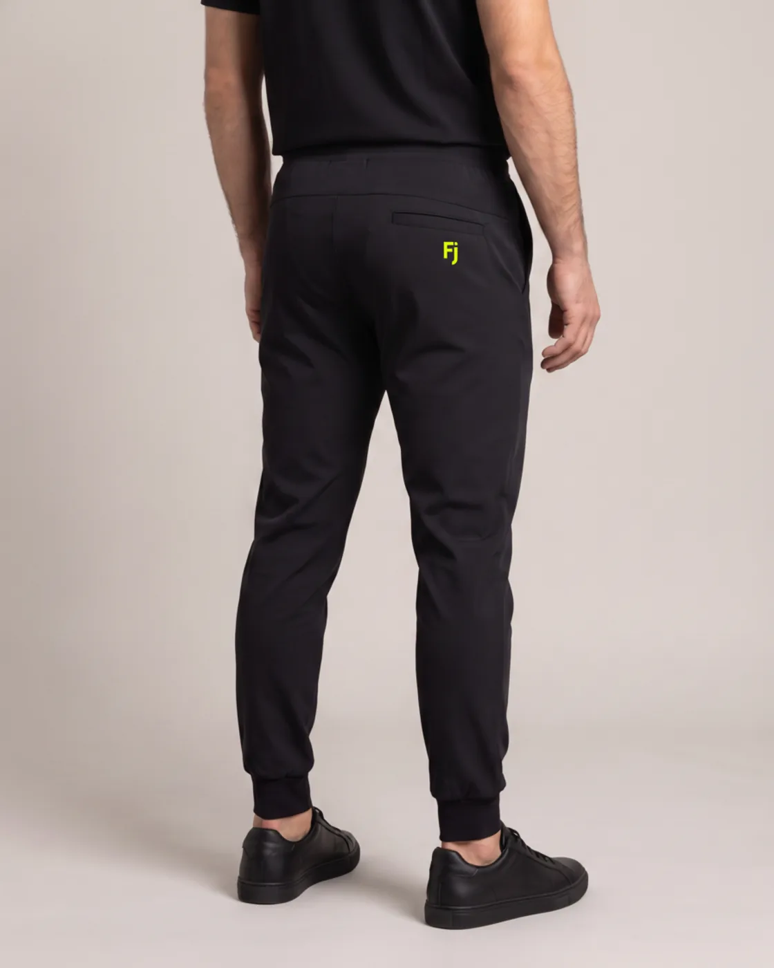Forjium tech joggers in a studio photograph