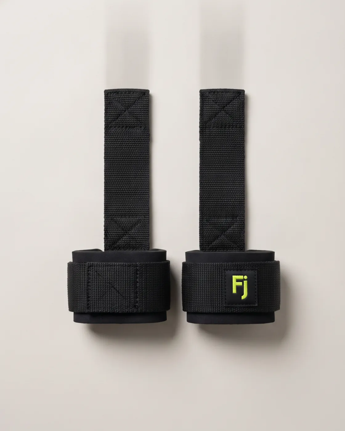 Forjium lifting straps in a studio photograph