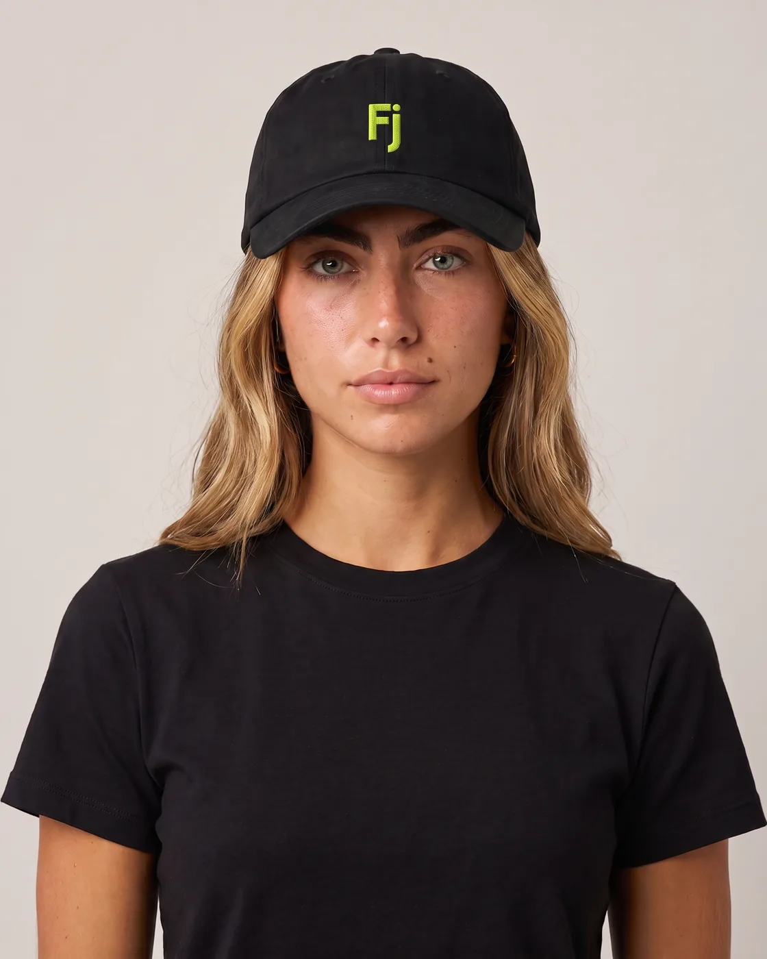 Forjium dad cap in a studio photograph